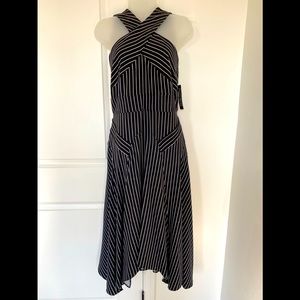 Beautiful black and white cross cross dress has never been worn.